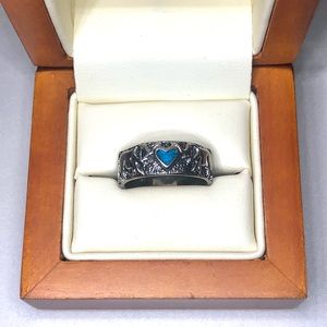 Elephants Holding Blue Heart Ring